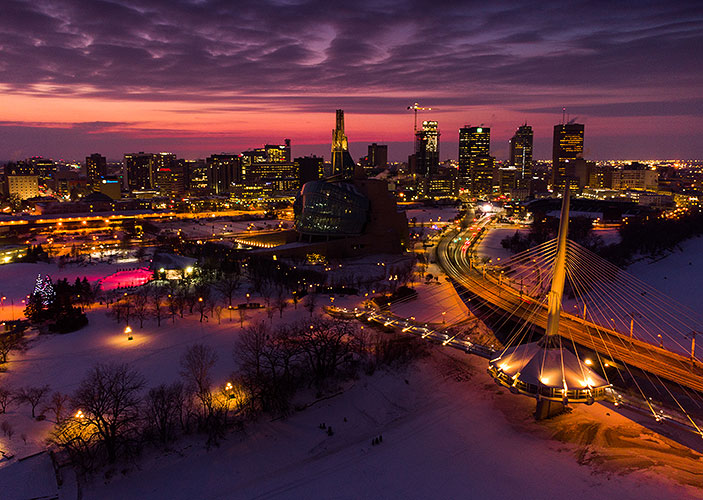 Downtown Winnipeg sunset over Provencher Bridge